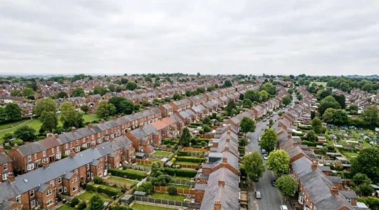 Aerial view of British residential neighbourhood showcasing property investment growth over time